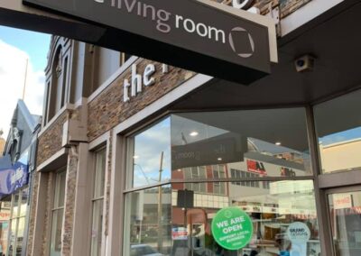 The Living Room COVID signage